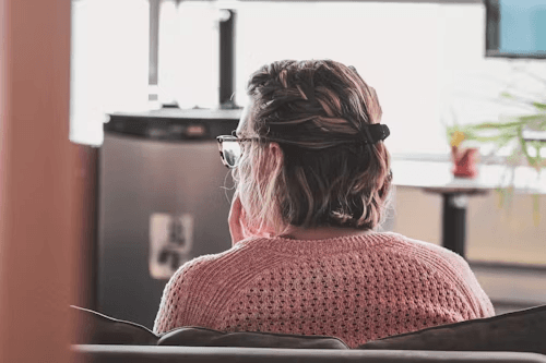 Professional educator at desk with educational resources